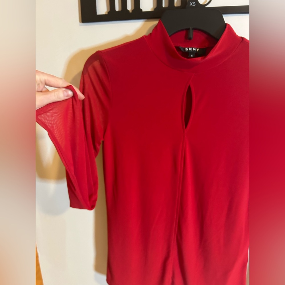 Sexy red, DKNY shirt. Loose fit with mesh sleeves, beautiful silky material